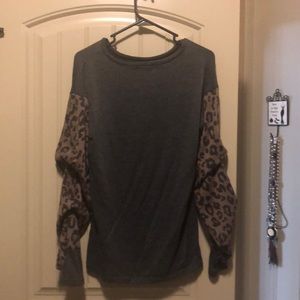 Gray shirt with leopard sleeves